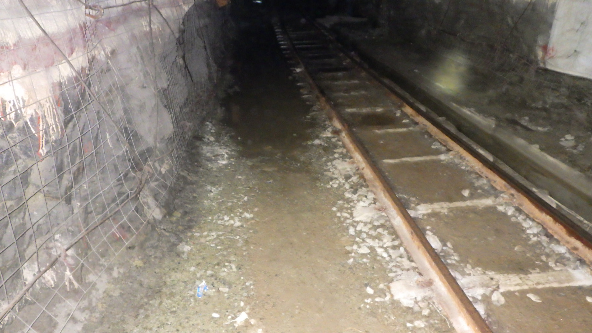 Cross Cut Management: Completed crosscut section. Restored passage with clean ballast, a clear drain line and unobstructed travelling clearance.