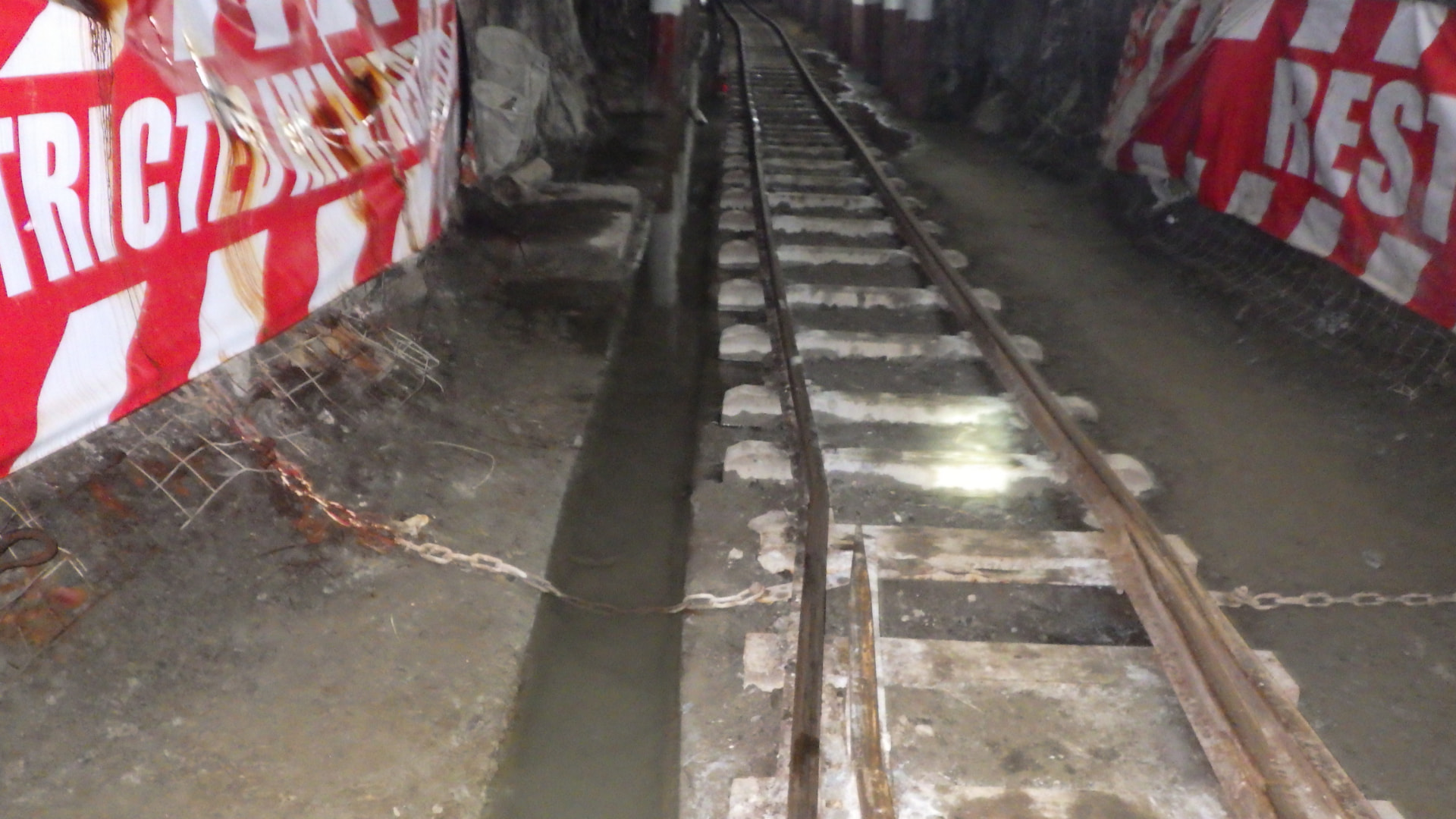 Cross Cut Management: Haulage cleared. Cleared footwall and aligned track giving locos, hoppers and personnel unobstructed access.